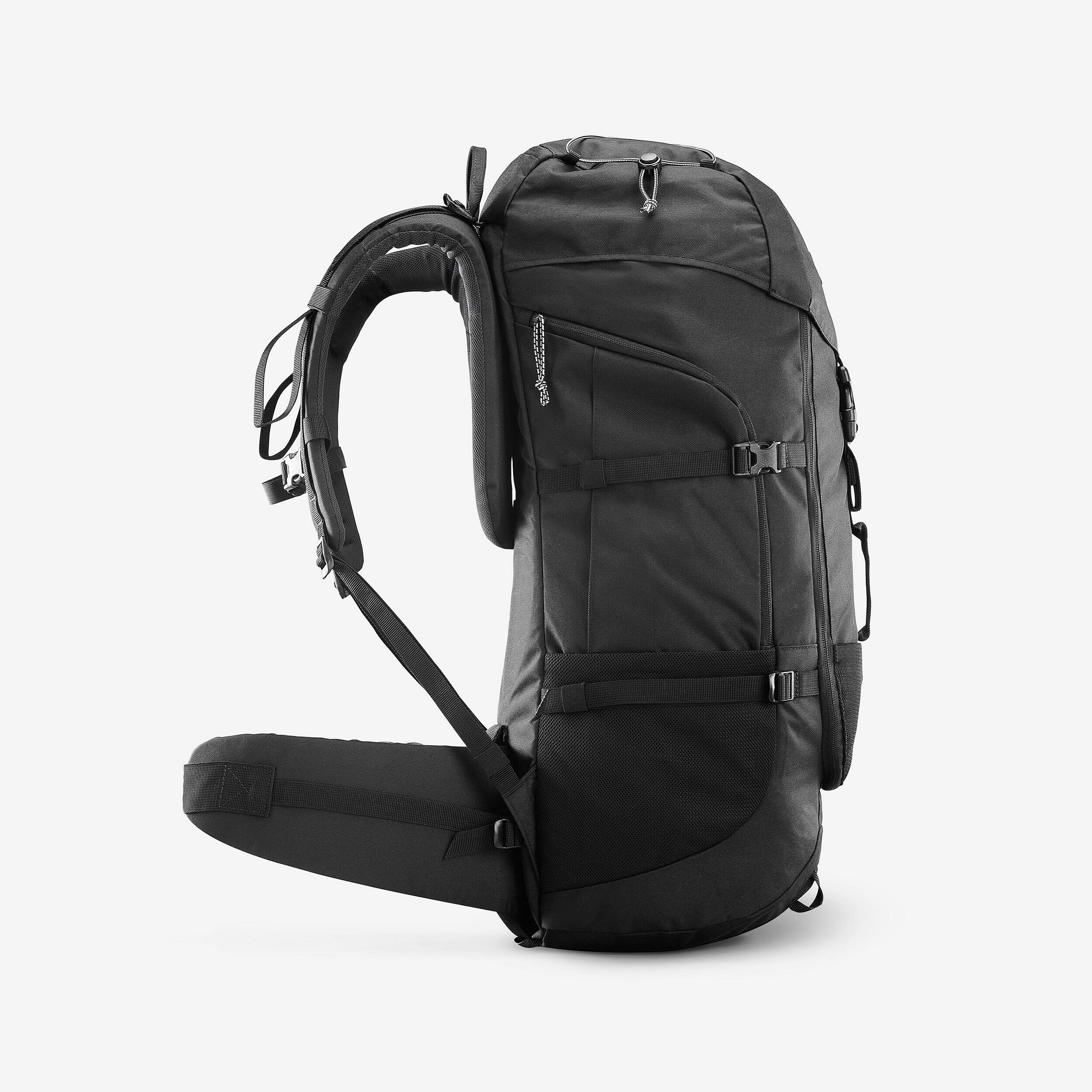 Zaino da trekking Simond MT100 50 l nero visto di lato con spallacci e richiami di carico