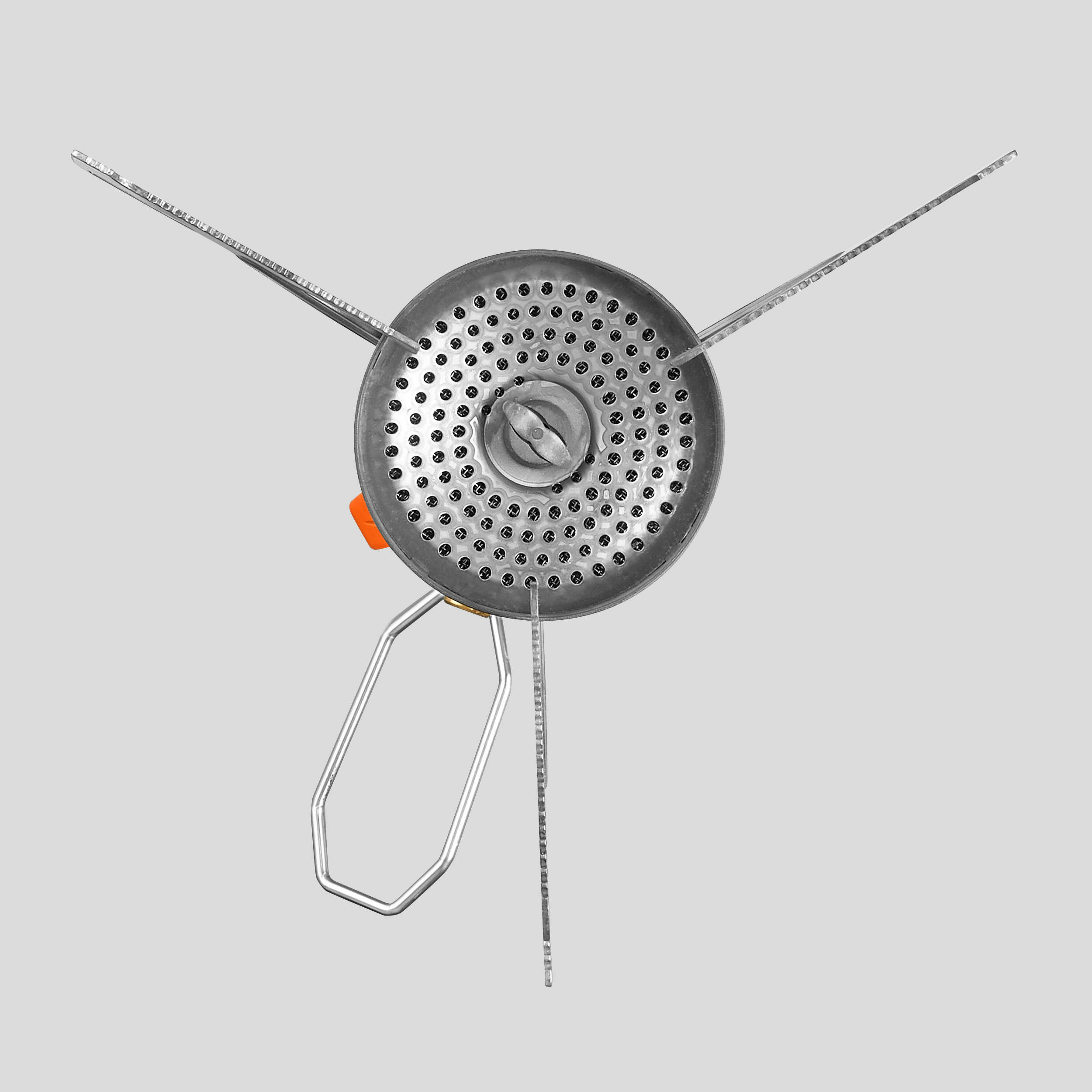 Bruciatore forato del fornellino Forclaz MT500 Compact visto dallalto con i tre supporti aperti