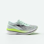 Scarpa running Kiprun Kipstorm Challenger grigia e verde menta vista di lato con l'intersuola giallo lime