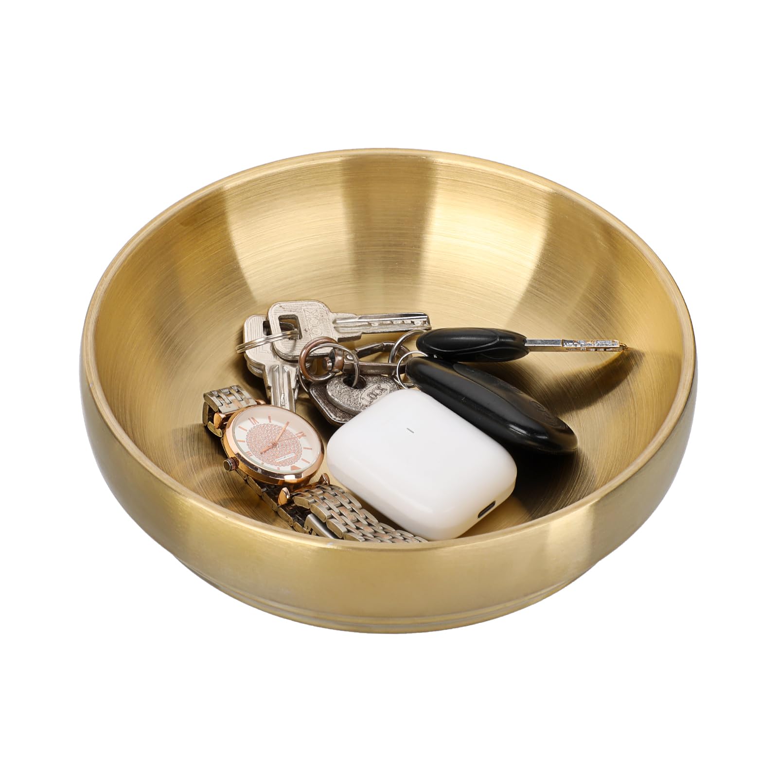 Goldfarbene Edelstahlschale mit hohem Rand, gefüllt mit Schlüsseln, Armbanduhr und Kopfhörer-Etui