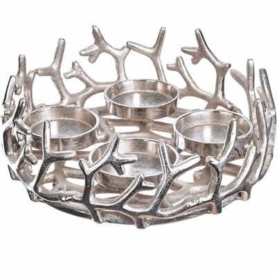 Silberner Adventskranz aus Aluminium mit ineinander verschlungenen Ästen und vier Kerzentellern