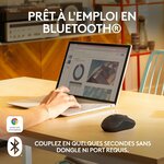 Souris prête à lemploi en Bluetooth à côté dun ordinateur portable
