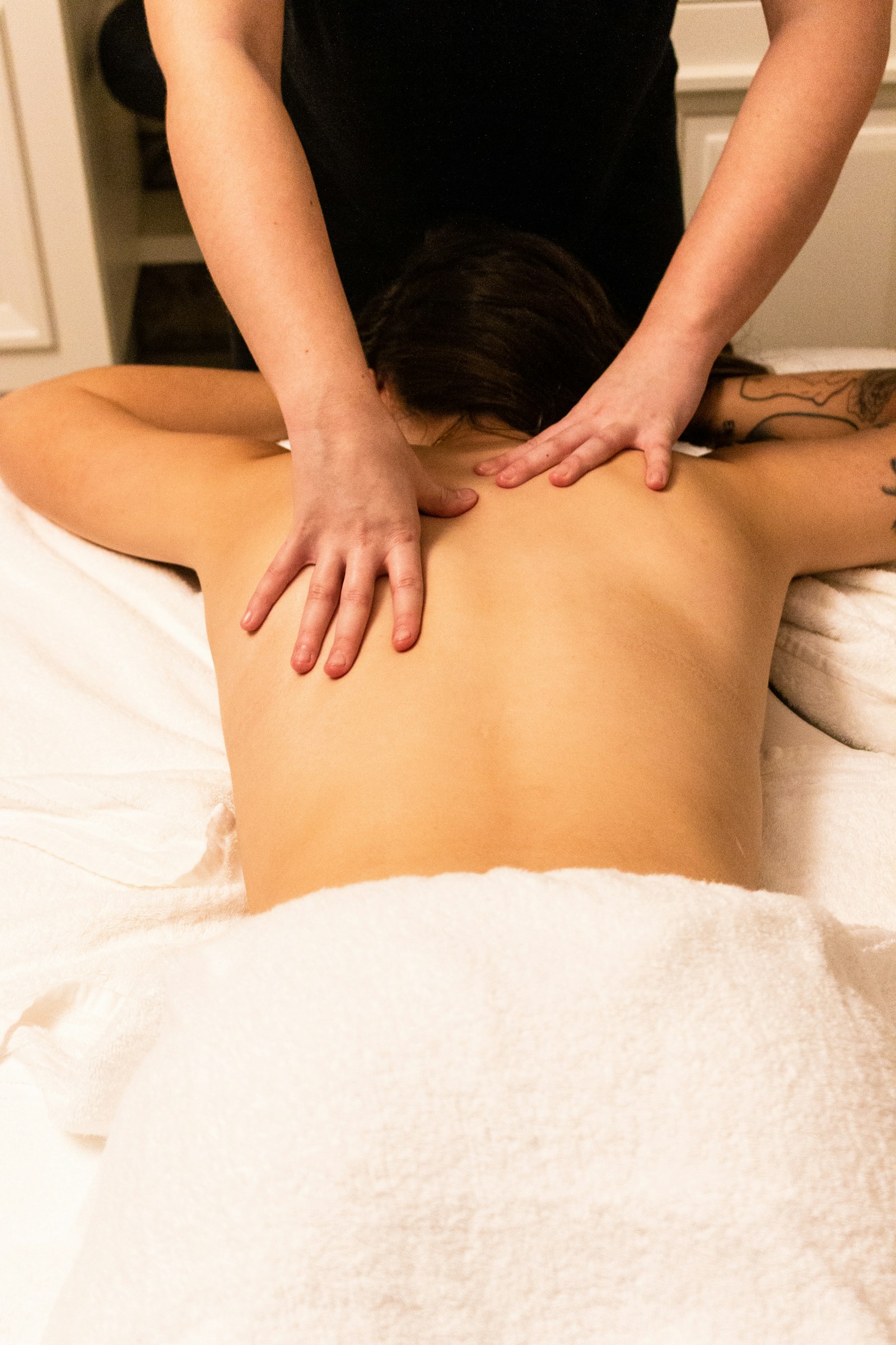 Massage du dos aux huiles chaudes