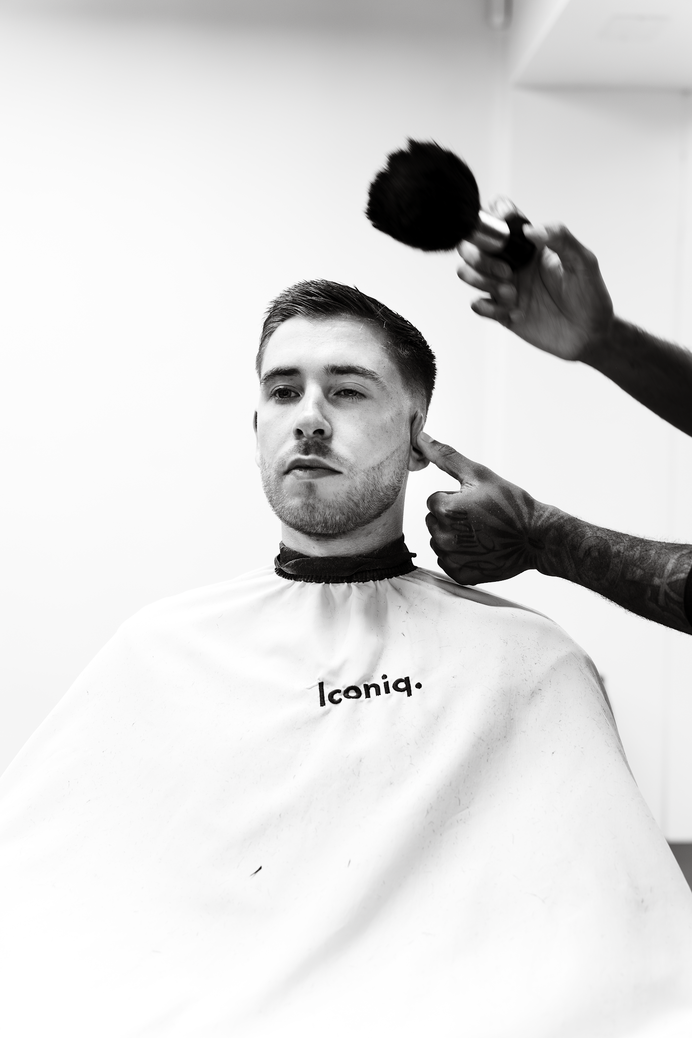 Finition d'une coupe homme chez ICONIQ