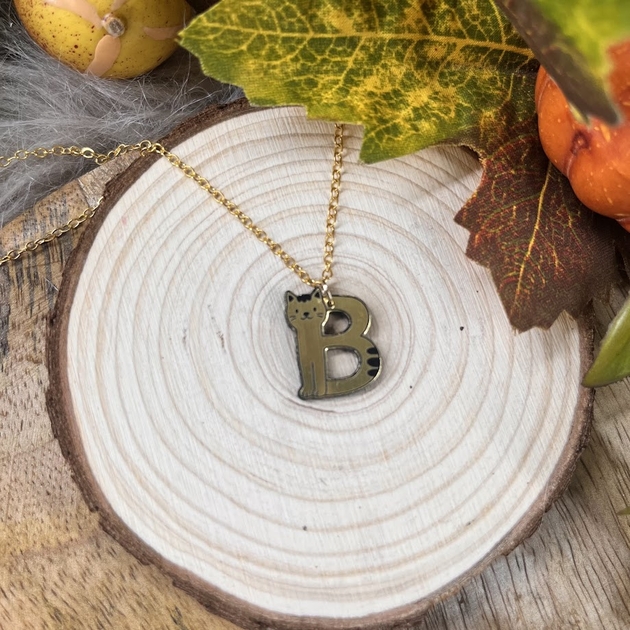 UNTAGS - Charm Letter D - Matiu00e8re Effet Cuir -Pendentif Smartphone, Porte-clu00e9s Avec Mousqueton, Crochet En Mu00e9tal Couleur Or Inclus - Noir