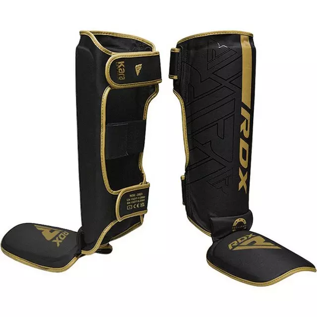 protege-tibias-boxe-f6-kara-rdx-noir-or