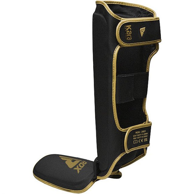 protege-tibia-boxe-f6-rdx-noir-or
