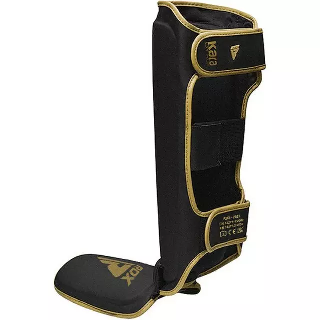 protege-tibia-boxe-f6-rdx-noir-or