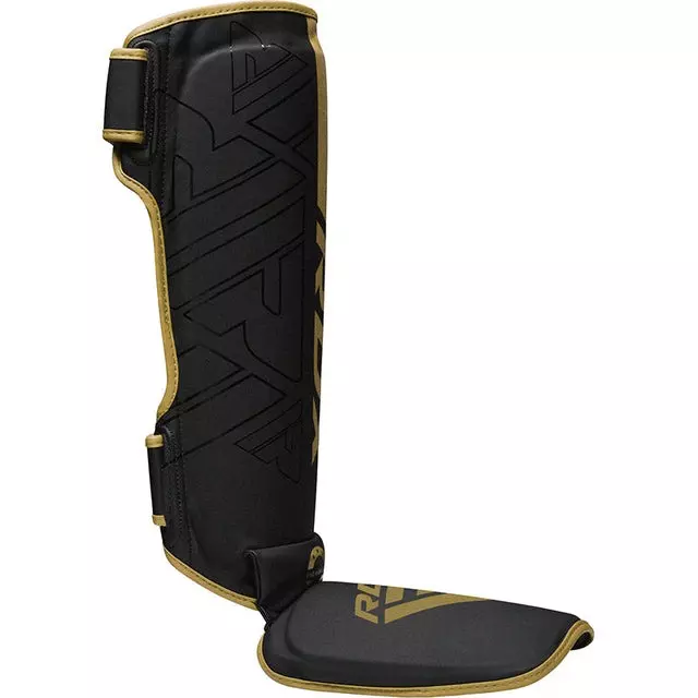 protege-tibias-de-boxe-kara-rdx-noir-or