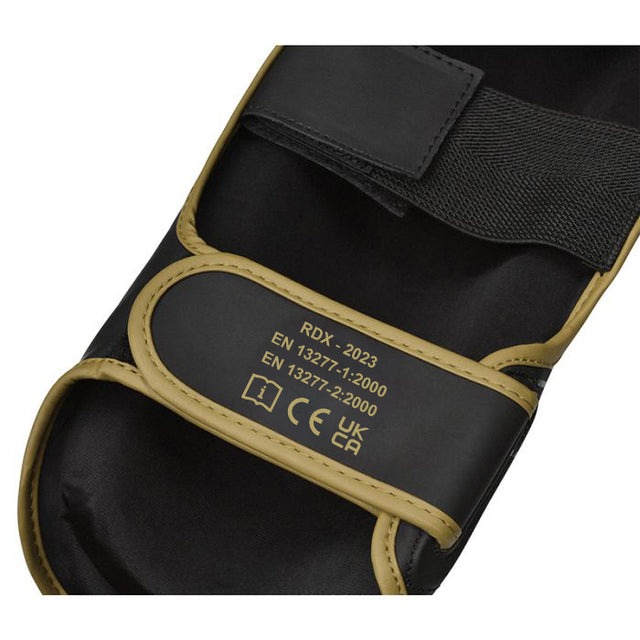 protege-tibias-boxe-f6-rdx-noir-or