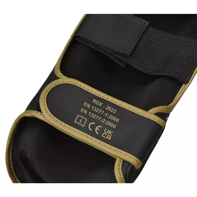 protege-tibias-boxe-f6-rdx-noir-or