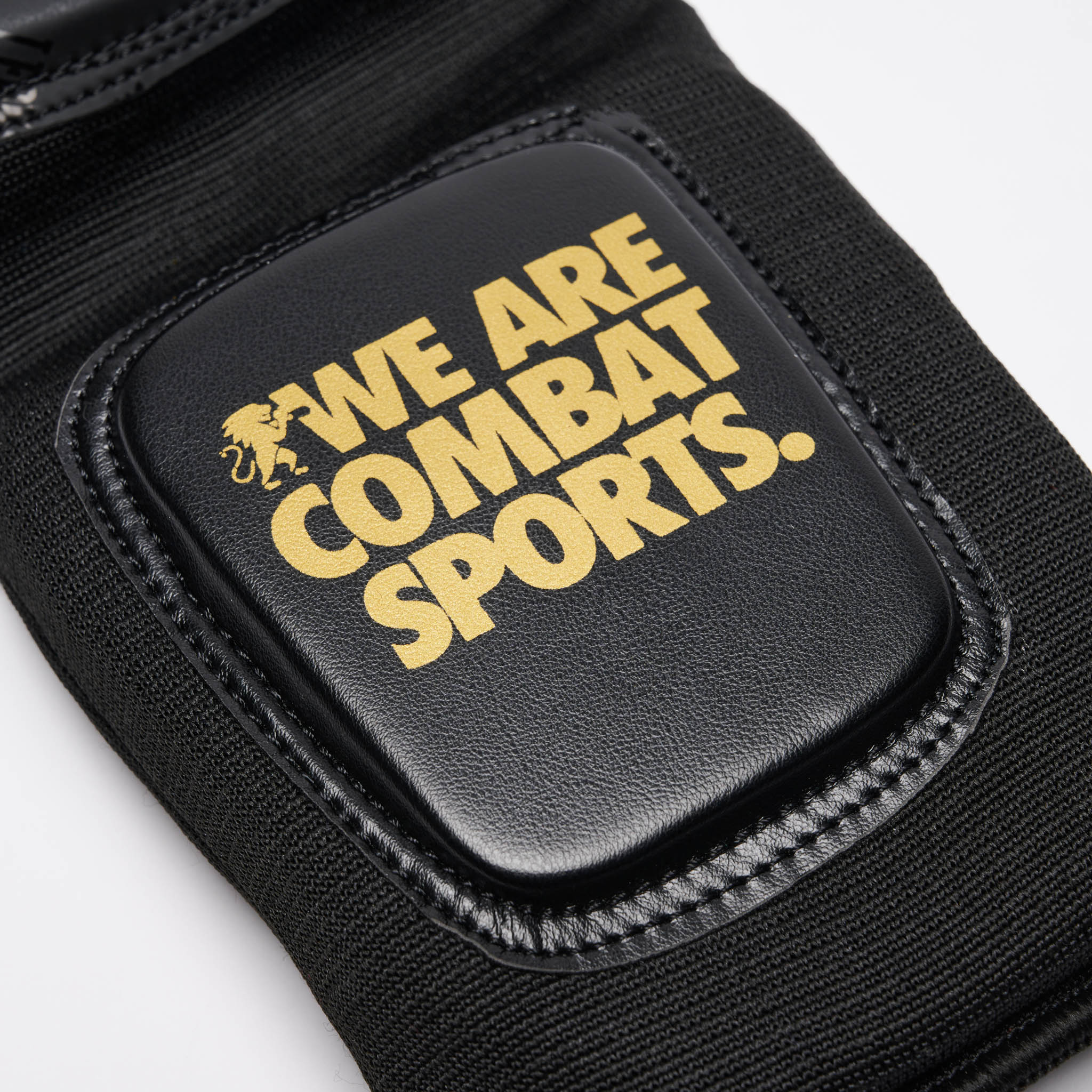 protege-tibias-boxe-leone-dna-noir