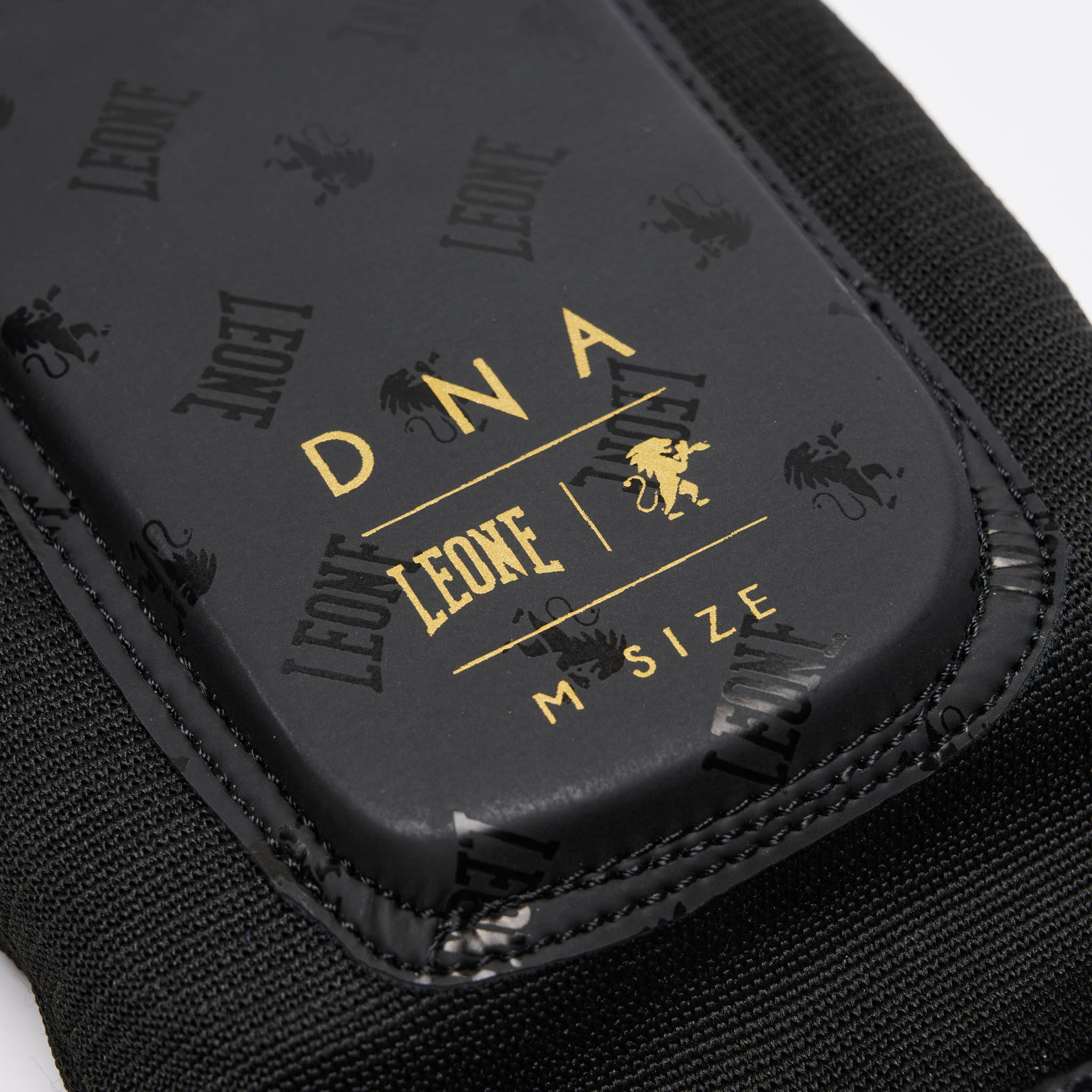 protege-tibias-boxe-dna-noir-leone