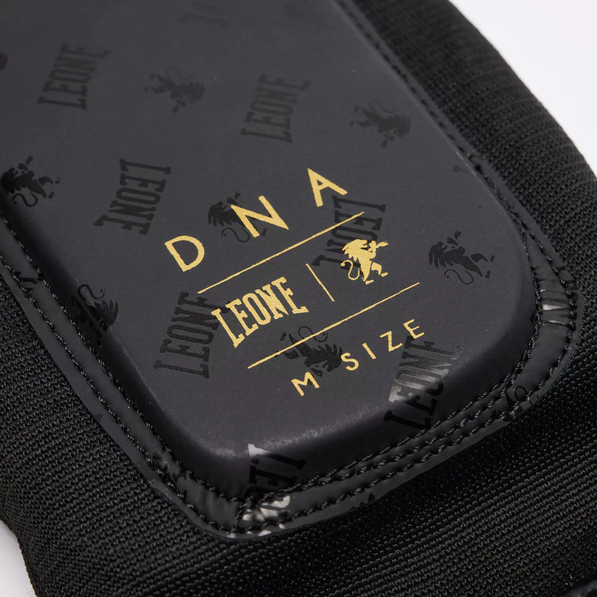 protege-tibias-boxe-dna-noir-leone