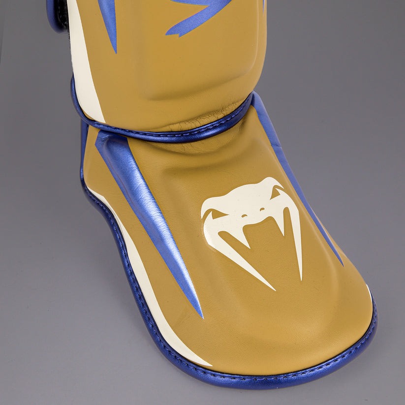 protege-tibias-venum-elite-camel-edition-speciale