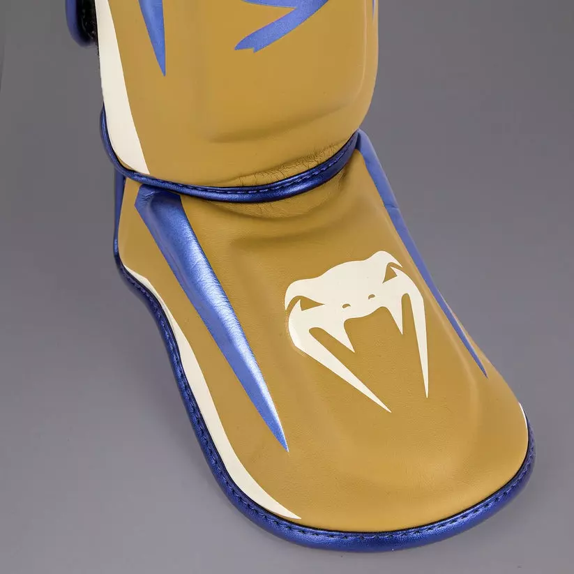 protege-tibias-venum-elite-camel-edition-speciale