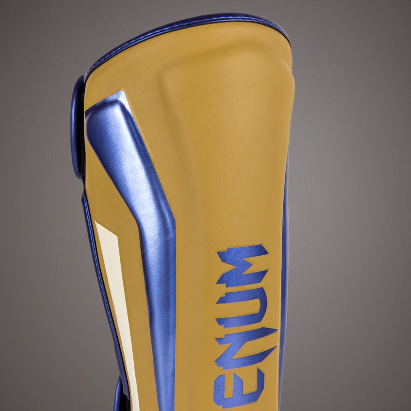 protege-tibia-venum-elite-camel