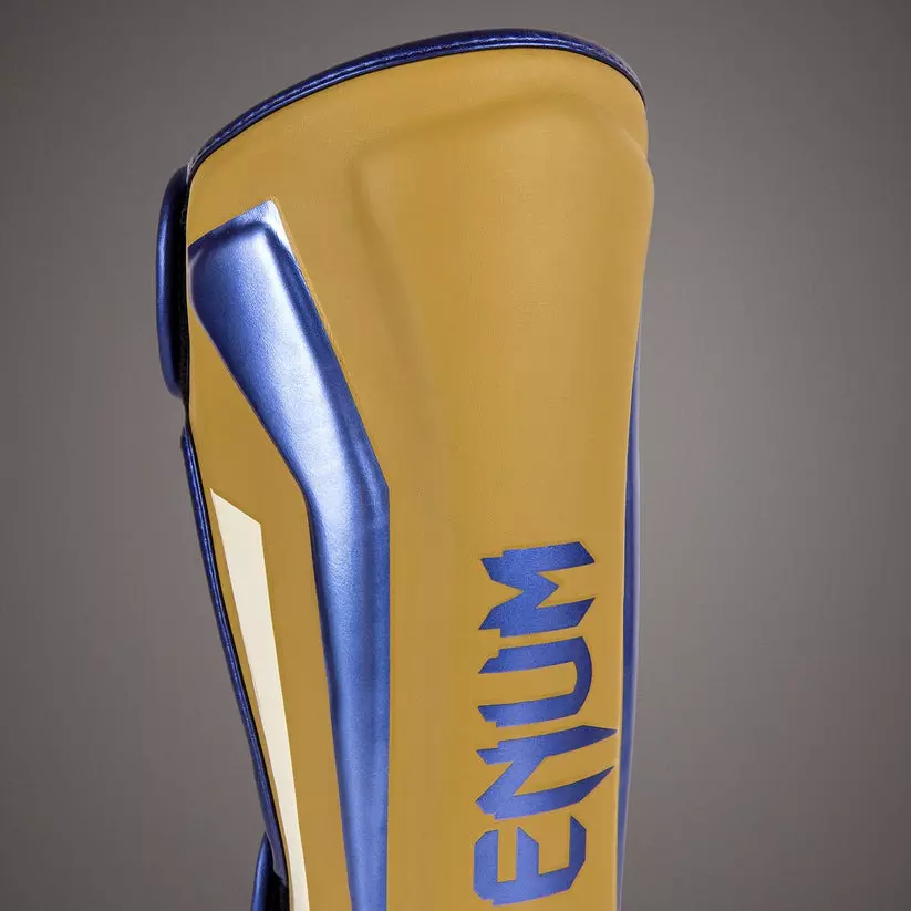 protege-tibia-venum-elite-camel