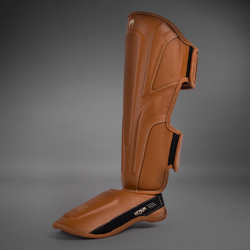 protege-tibias-venum-impact-evo-marron