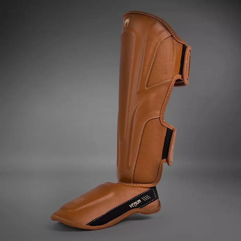 protege-tibias-venum-impact-evo-marron