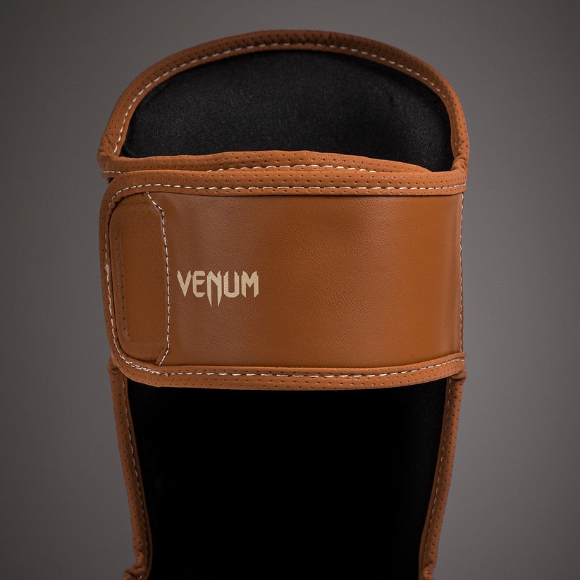 protege-tibia-venum-impact-evo-marron