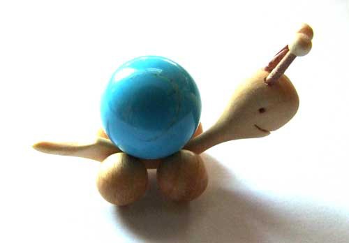 1486-boule-de-massage-2-cm-en-howlite-turquoise-support-escargot