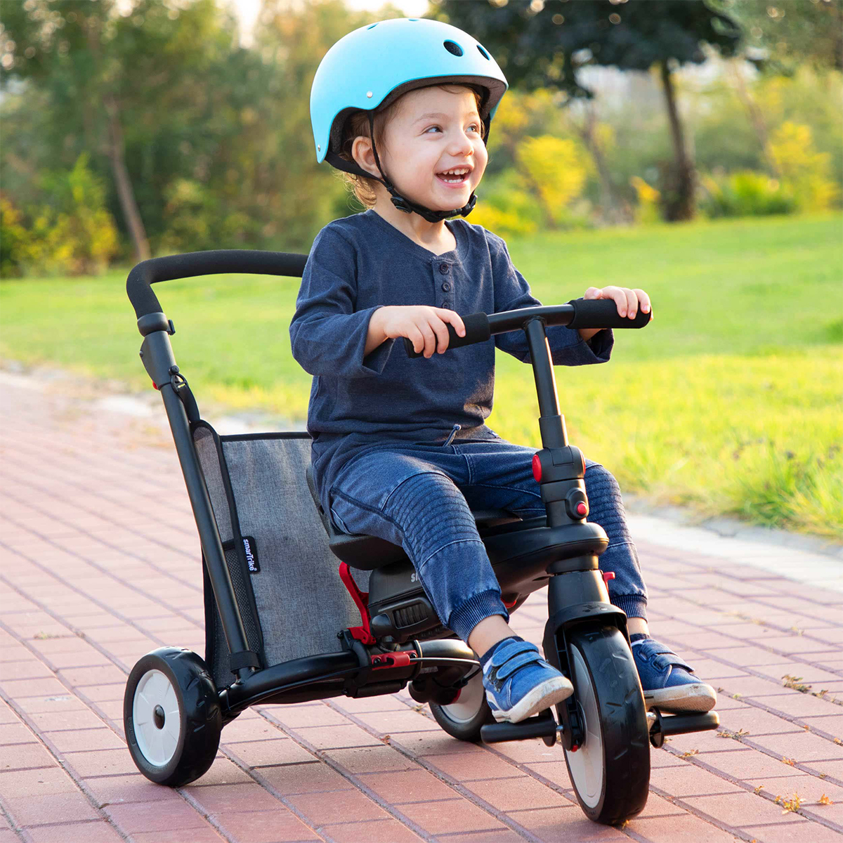 Tricycle évolutif SmarTrike Enfant Noir Et Gris - Très Bon état