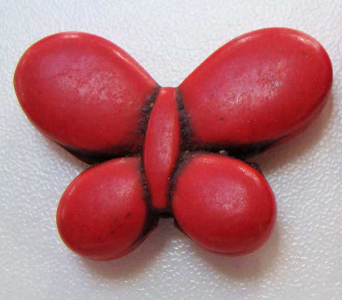 perle turquoise papillon rouge pier49