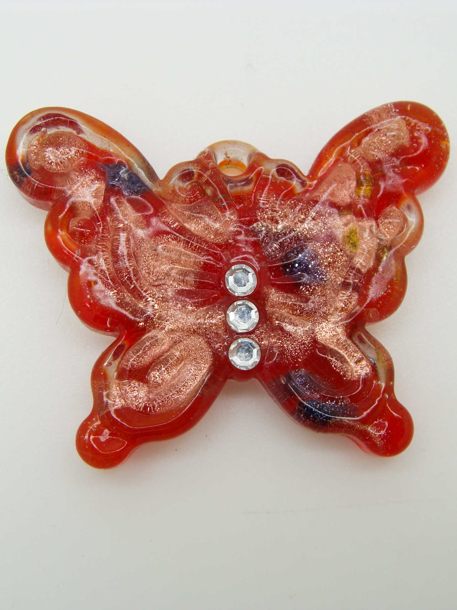 Pend-303-4 pendentif papillon strass rouge dore