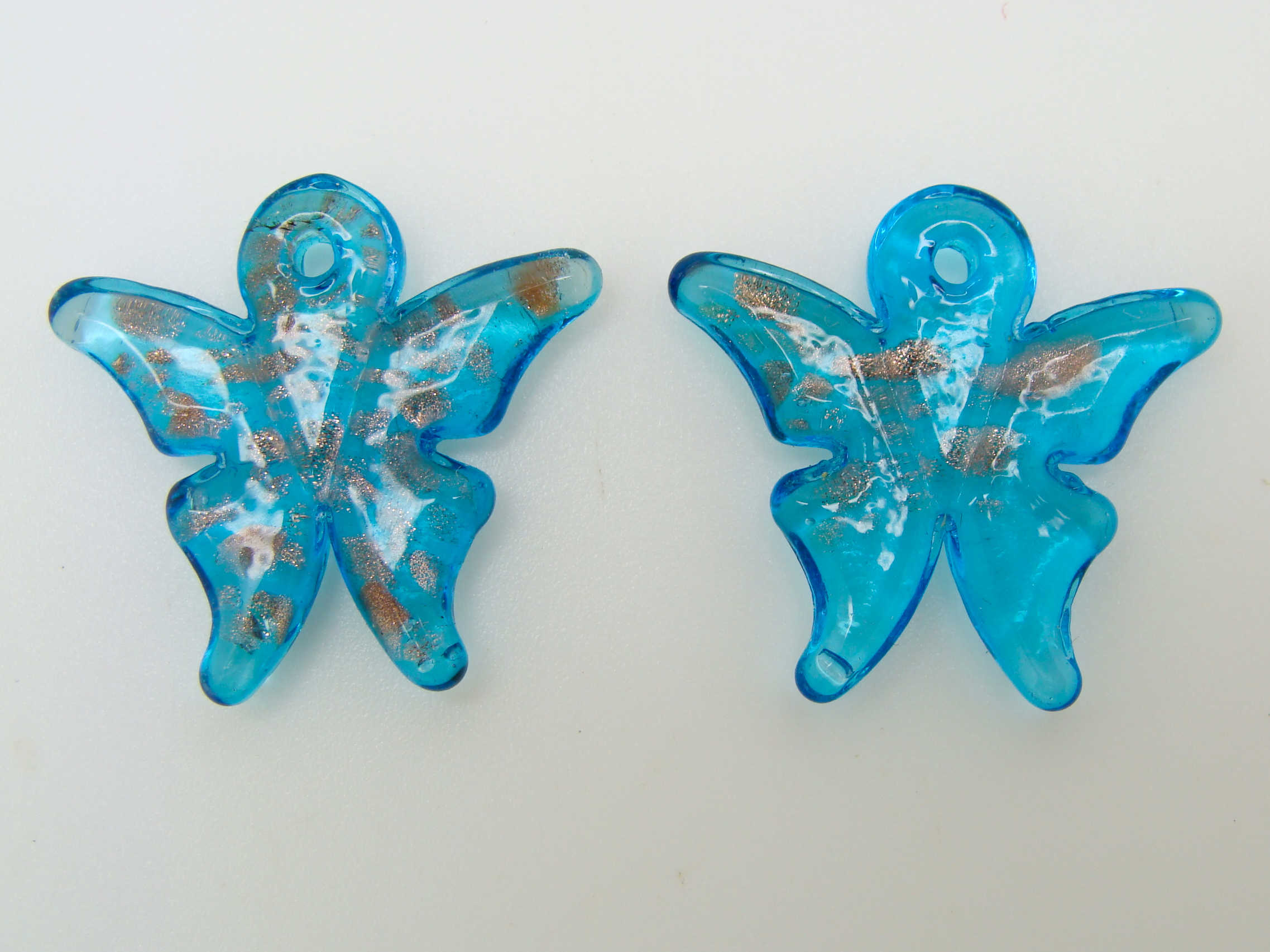 Pend-308-1 pendentif mini papillon bleu dore