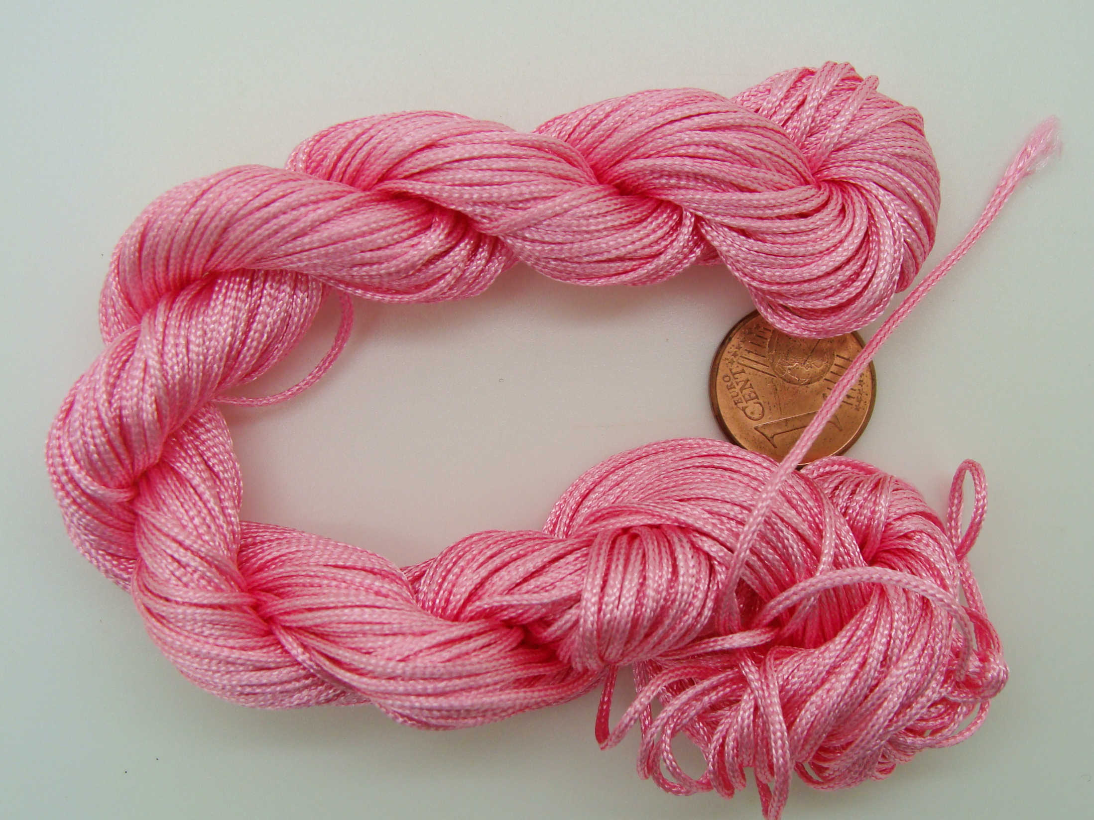 fil nylon 1mm rose fonce echeveau