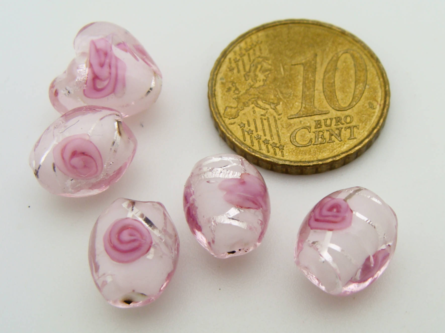 perle rose ovale 10x8 fleur