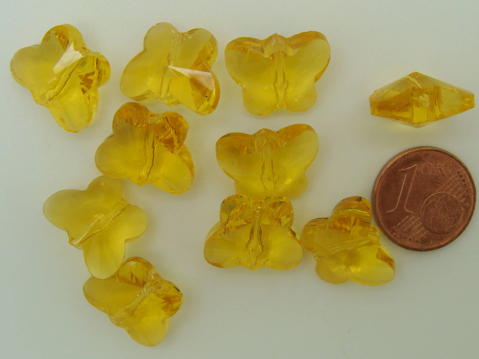 perle papillon facette jaune