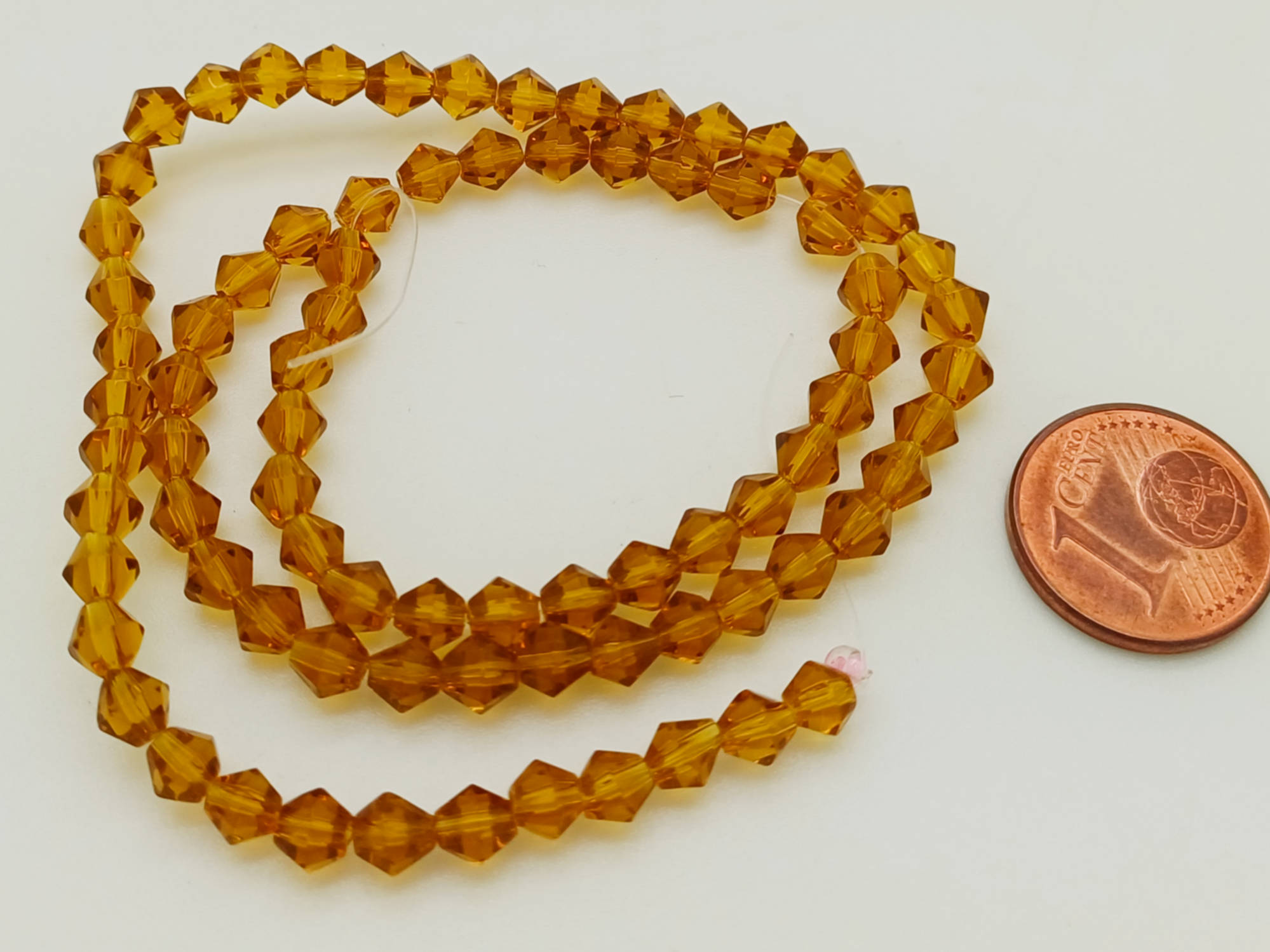 perles verre toupie facette 4mm marron en fil