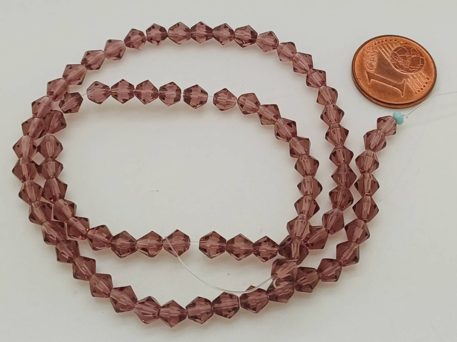 perles verre toupie facette 4mm violet en fil