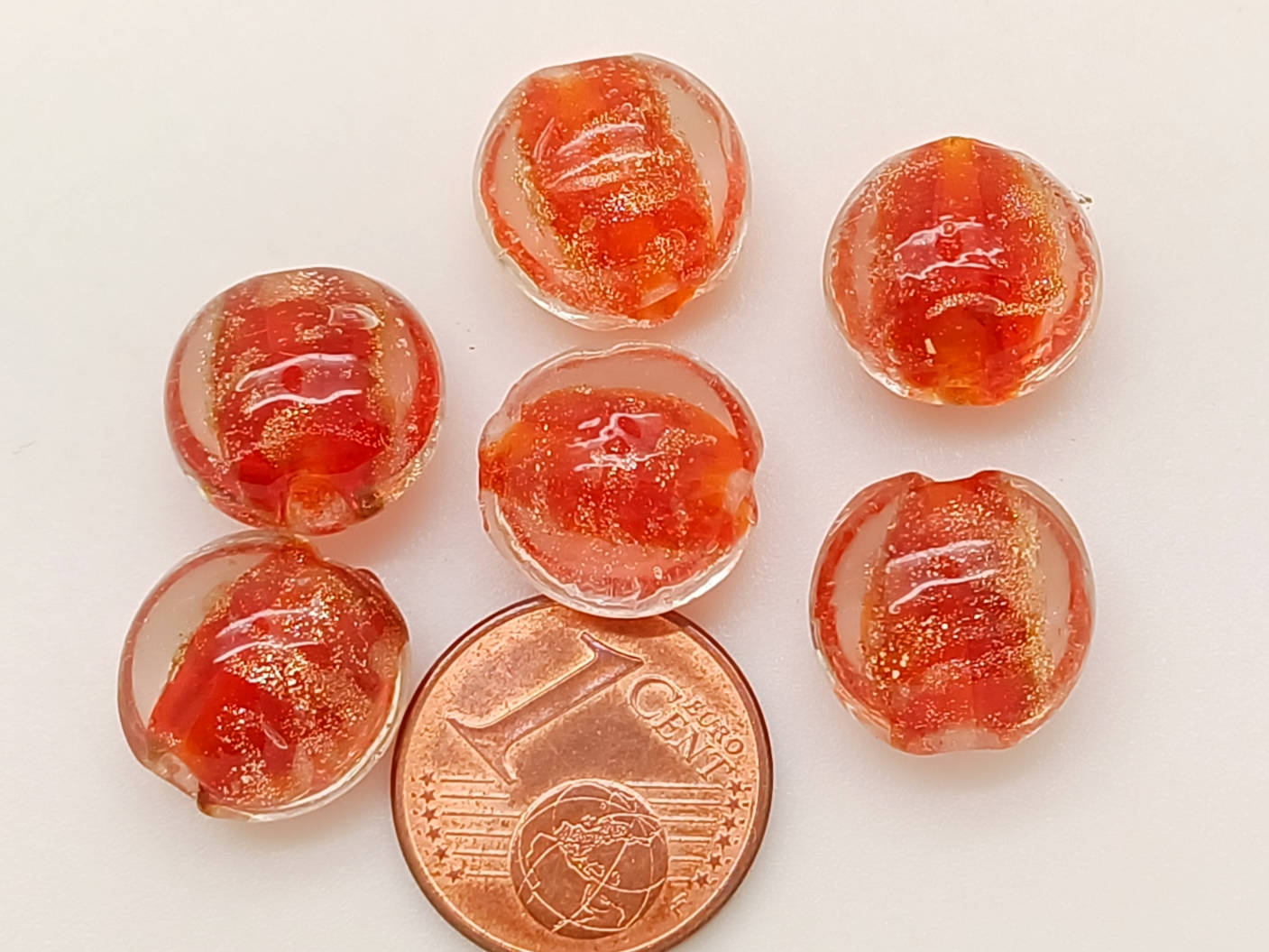 perle galets 12mm dore rouge