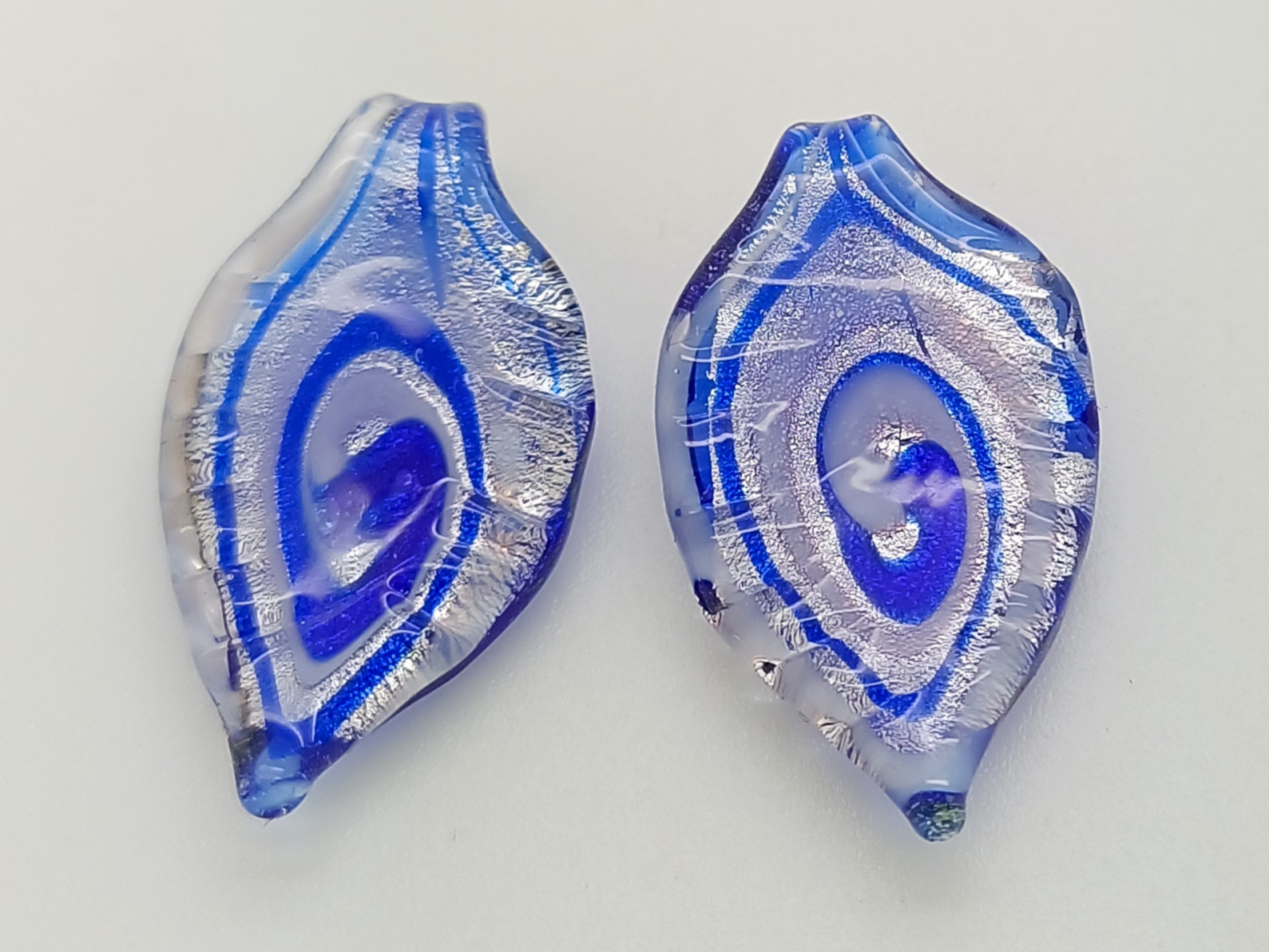 Pend-443 pendentif mini goutte volute bleu argente