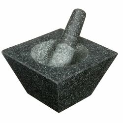 Mortier et pilon trapèze en granit de Divers