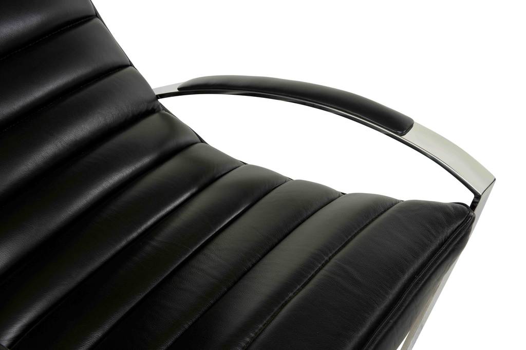 détail-cuir-noir-fauteuil-vintage-incliné