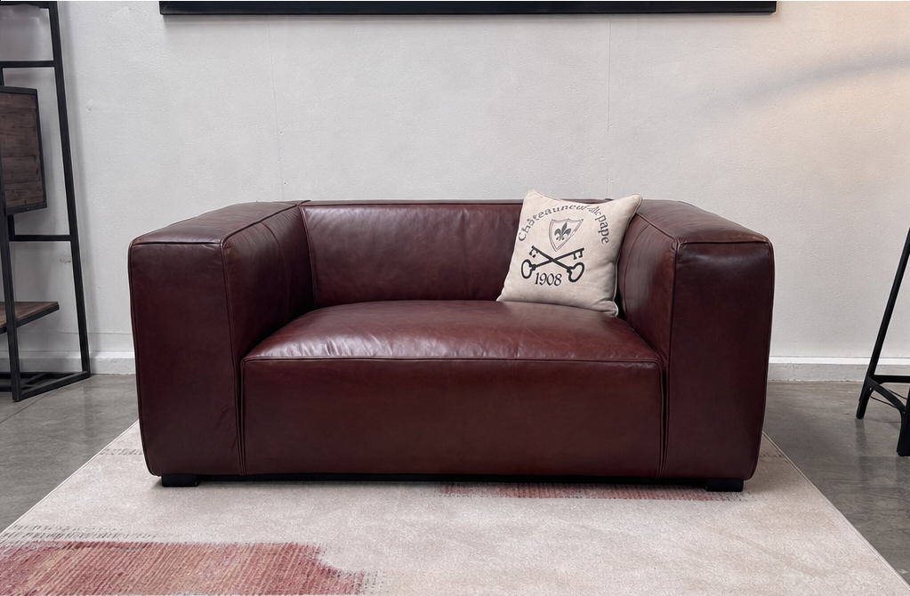 fauteuil-cuir-assise-basse-vintage