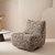 fauteuil-pivotant-design-contemporain-tissu-texture-brun-beige-salon-moderne