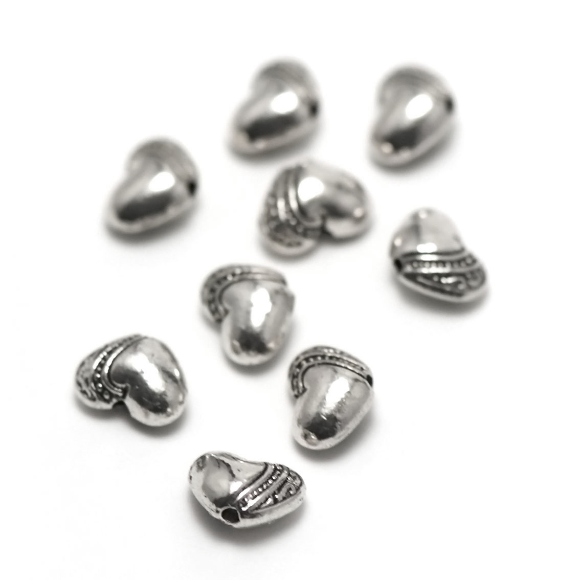 10 perles coeur motif asymétrique10x7x5 mm,métal argenté,021A