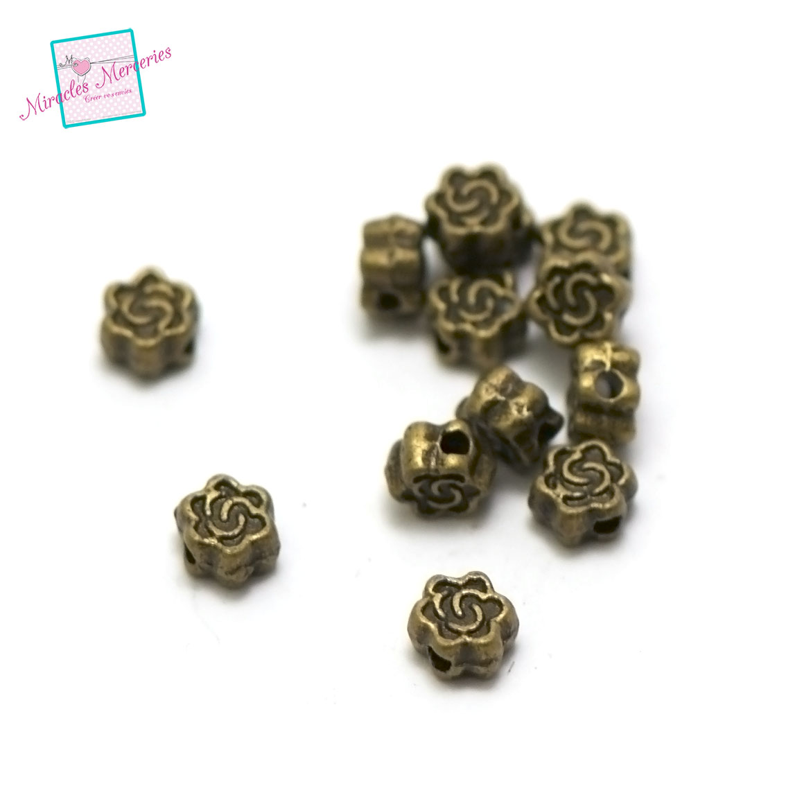 50 perles fleurs4x4x3mm,bronze 005