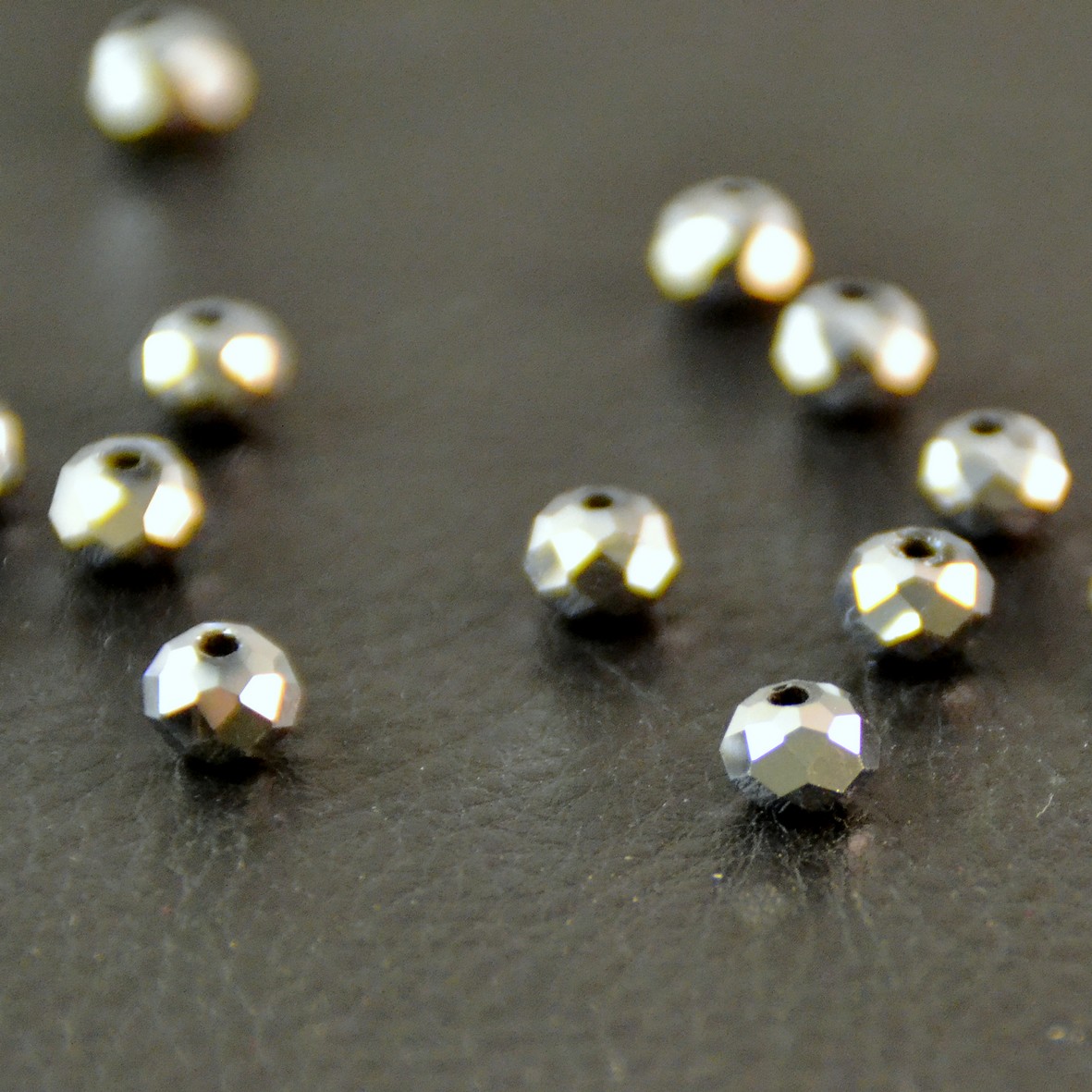 20 moyennes perles cristalrondelle 6x5 mm,argenté