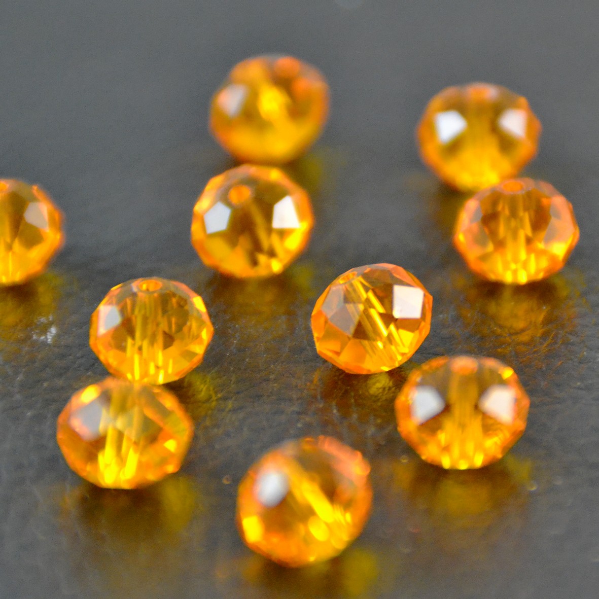 10 grandes perles rondelette facettée10x7 mm,orange