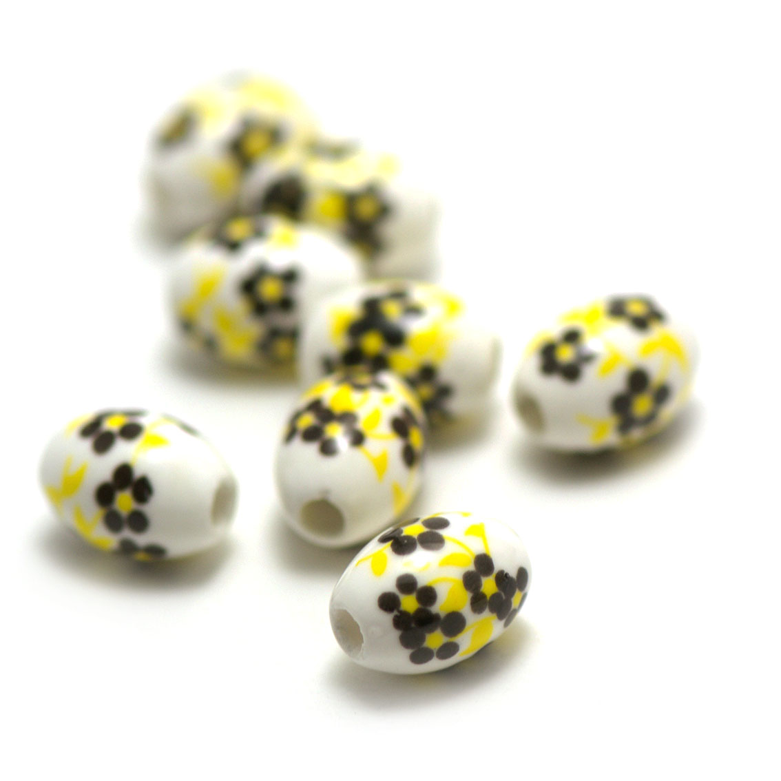 10 perles porcelaine olive fleur14x10 mm,jaune noir sur fond blanc