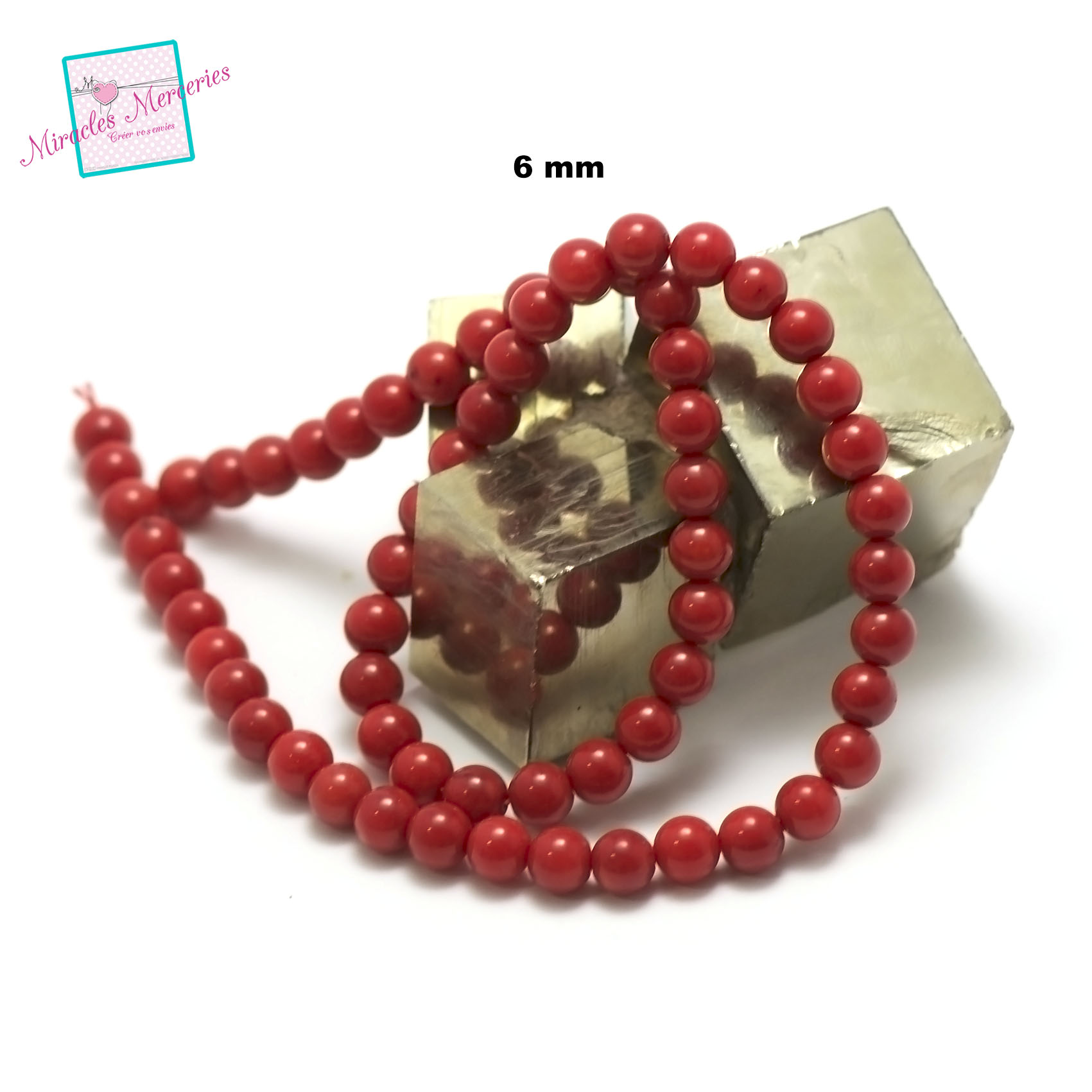 fil de 39 cm perles de corail/bambou de merronde 6 mm