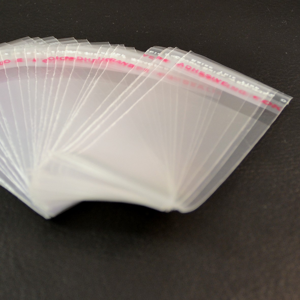 100 pochettes plastiques autocollants 6x4 +2 cm - Pochette plastique -  Miracles Merceries
