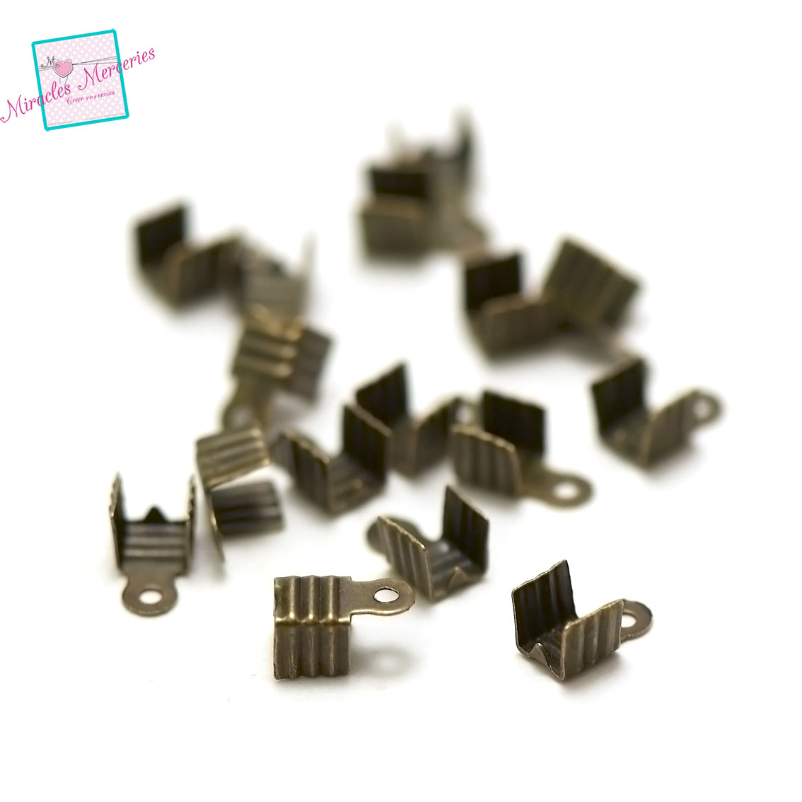 embout rectangle motif 7x4 mm bronze