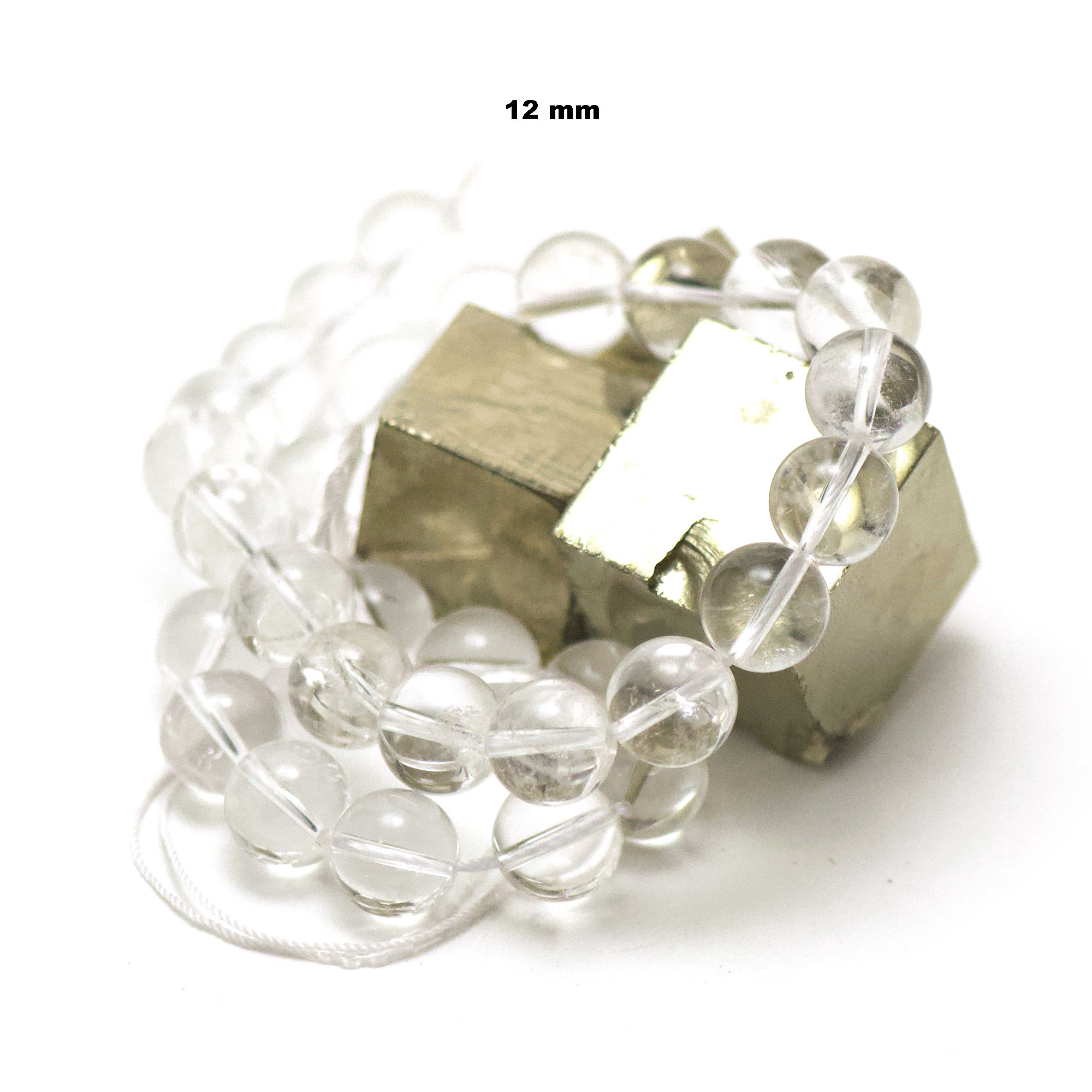 fil de 39 cm env 32 perles de cristal de roche ronde 12 mm